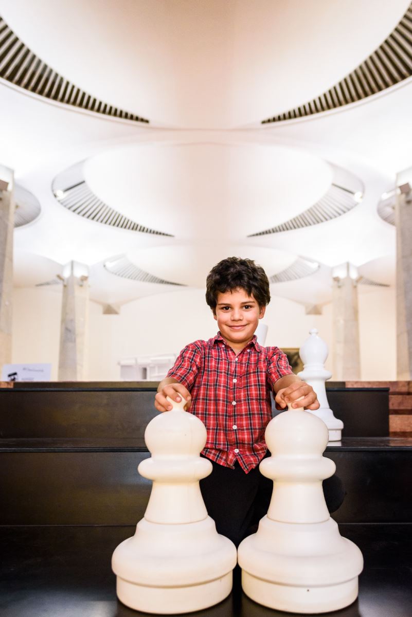 boy with large pawns
